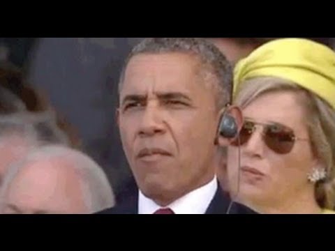 أوباما يمضغ العلكة خلال أداء النشيد الوطني الفرنسي