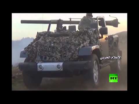 شاهد الجيش السوري يطلق صواريخ على مواقع المسلحين