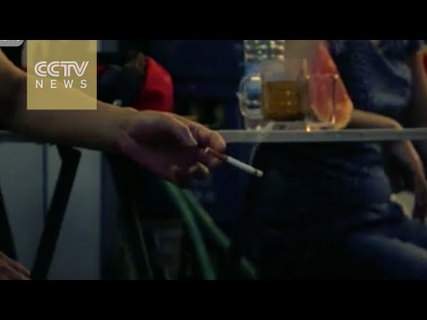 volunteers track down illicit smokers in beijing