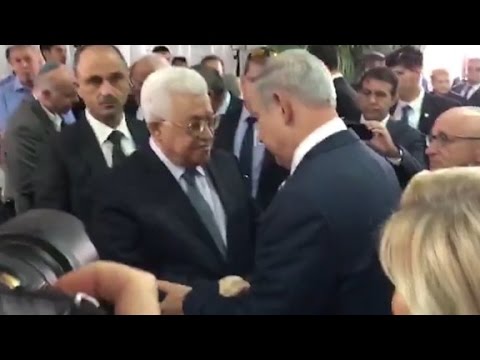 abbas netanyahu shake hands at shimon peres funera