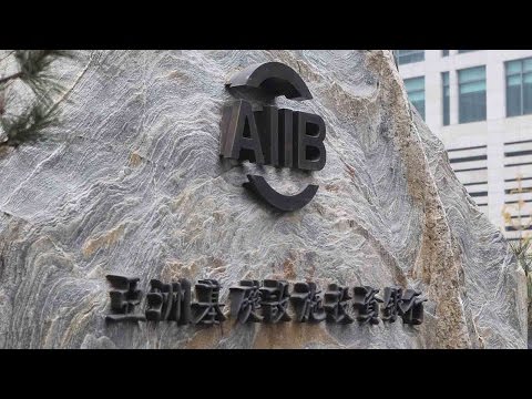 aiib president pushes for further