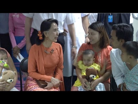 aung san suu kyi visits myanmar children