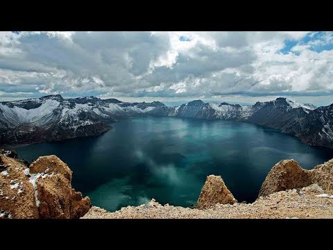 thawsome sight china’s largest volcanic lake melts for the summer