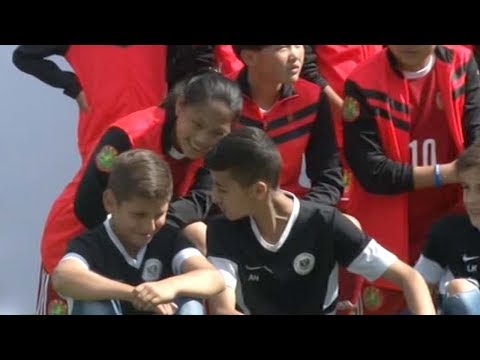 football match between german chinese youngsters