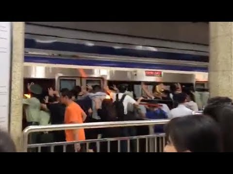 pushing train to rescue trapped subway passenger