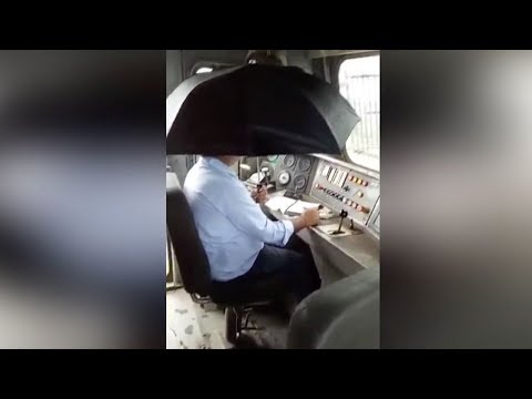 indian train driver forced to shelter from rain