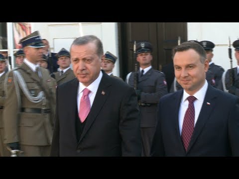 turkeys president arrives in poland