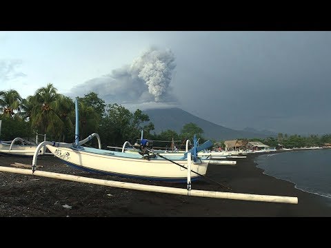 bali airport reopens but alert level remains