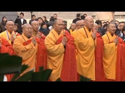 monks hold religious service for world peace