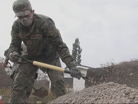 soldiers clear ash from chile volcano