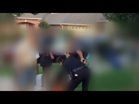 texas cop caught on camera pulling gun on kids