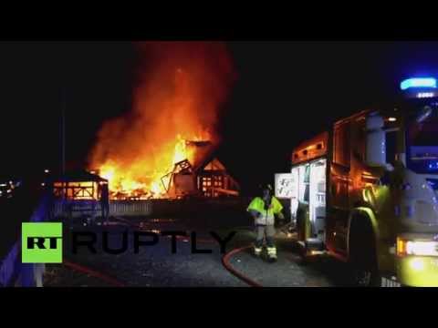 fierce blaze devastates norway refugee shelter