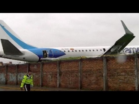 plane skids off runway in ecuador