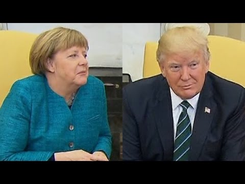 snub merkel handshake