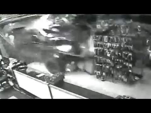 truck smashed into gun shop in