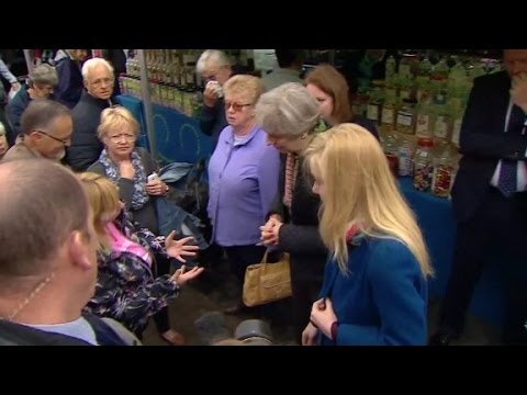 british pm confronted by constituent at outdoor market