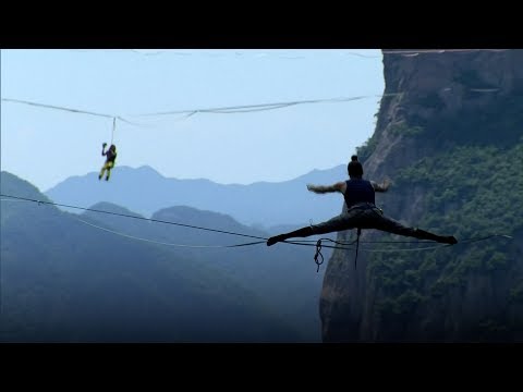 slackliners perform thrilling stunts