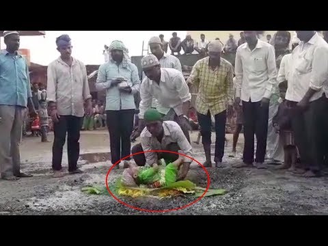 father places baby on hot coals to fulfill religious vow